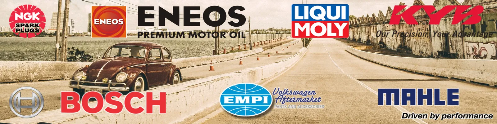 Brands banner with a classic Volkswagen Beetle on an open road, surrounded by NGK, ENEOS, LIQUI MOLY, KYB, Bosch, EMPI and MAHLE logos